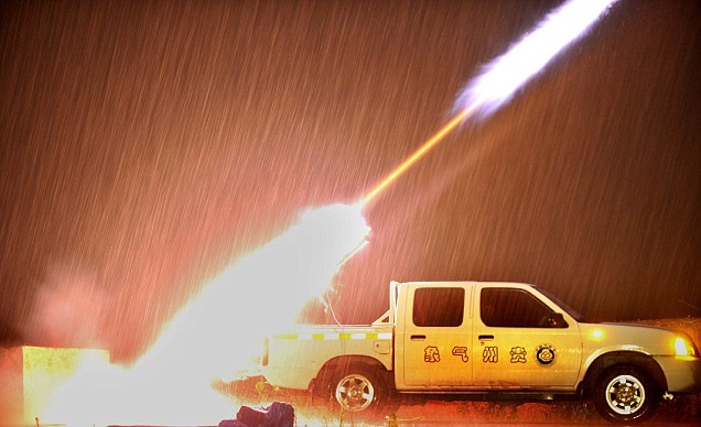 Rockets used to seed clouds are fired from the back of a truck in China