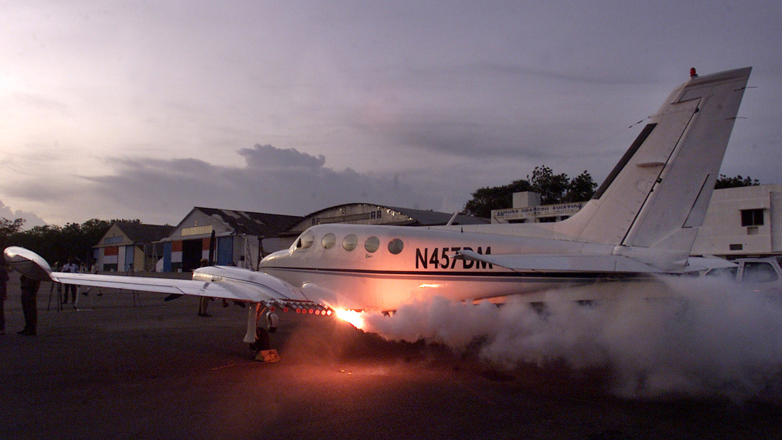 Cloud seeding flares mounted on an aircraft